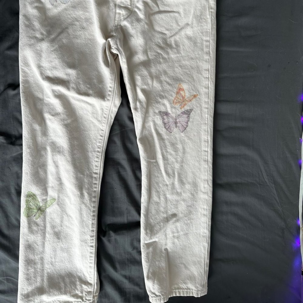 Levi Strauss &co. white buterfly jeans